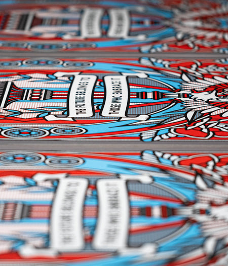 Close-up of a limited edition print by the artist Red Halftone with red, blue, and white colors.