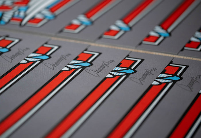 Close-up of signed limited edition prints by the artist Red Halftone.