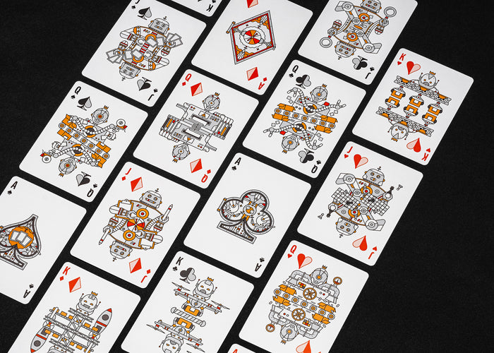 Playing cards with robot illustrations on a black background