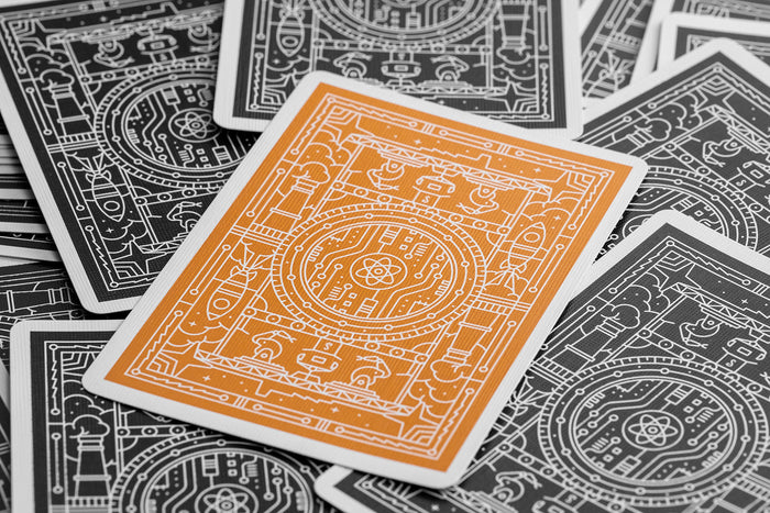 Playing cards with intricate space and robot-themed designs