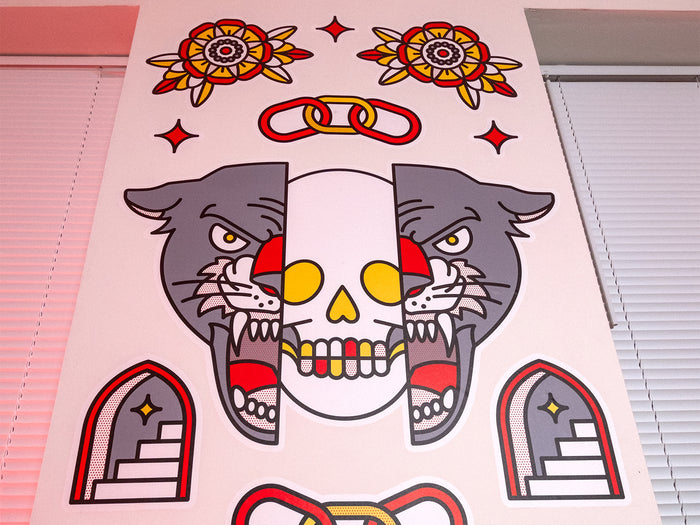 Cat skull wall grpahics with colorful floral elements on a wall