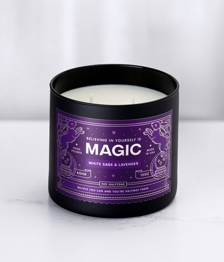 'Magic' Red Halftone Candle in a black glass jar with a purple label on a white background