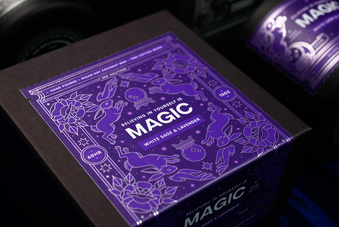Purple Magic candle box packaging with text and graphics on a dark background