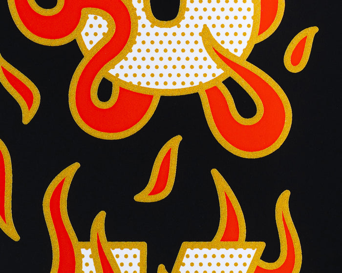 A detail shot of a limited edition screen print by the artist Red Halftone with red flames and metallic gold outlines on a black background.