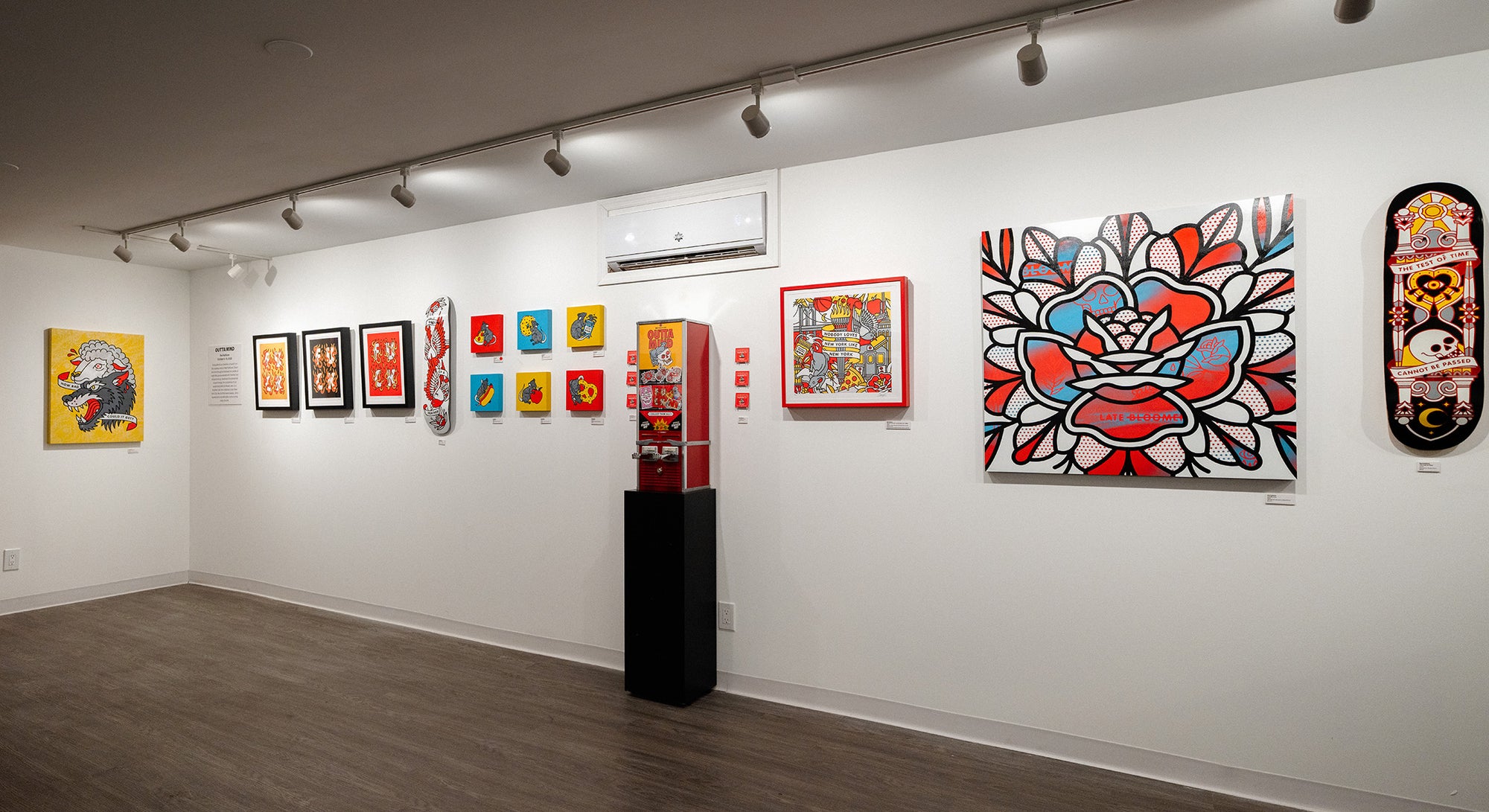 Studio6 art gallery featuring various artworks by Red Halftone on the walls