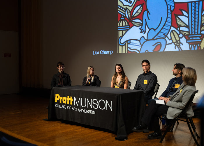 Panel discussion at Pratt Munson College of Art and Design with a screen displaying artwork in the background.