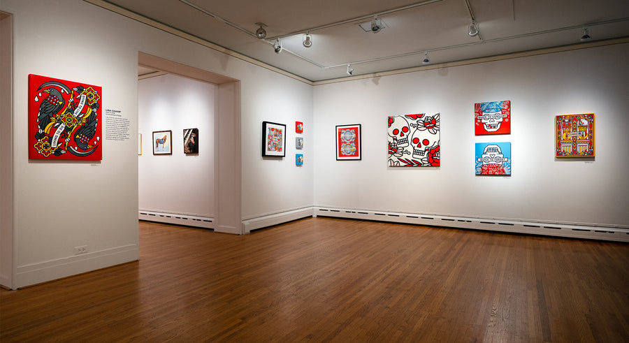 Art gallery at Pratt Munson with artwork by Lisa Champ of Red Halftone on white walls and a wooden floor.