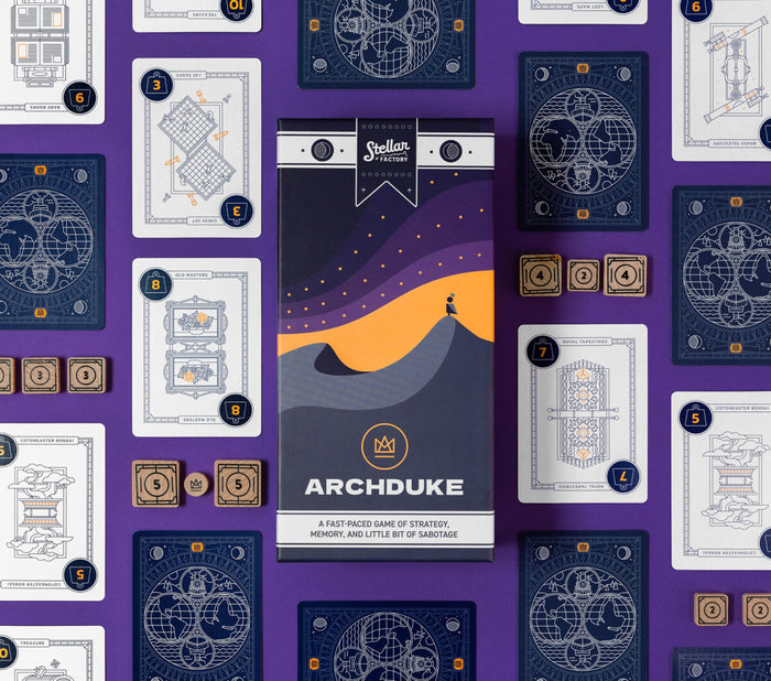 Overhead view of Card game packaging for 'Archduke' with cards and game pieces on a purple background