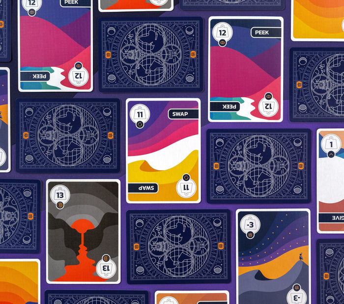 Pattern of playing cards showing fronts and backs with various designs on a purple background