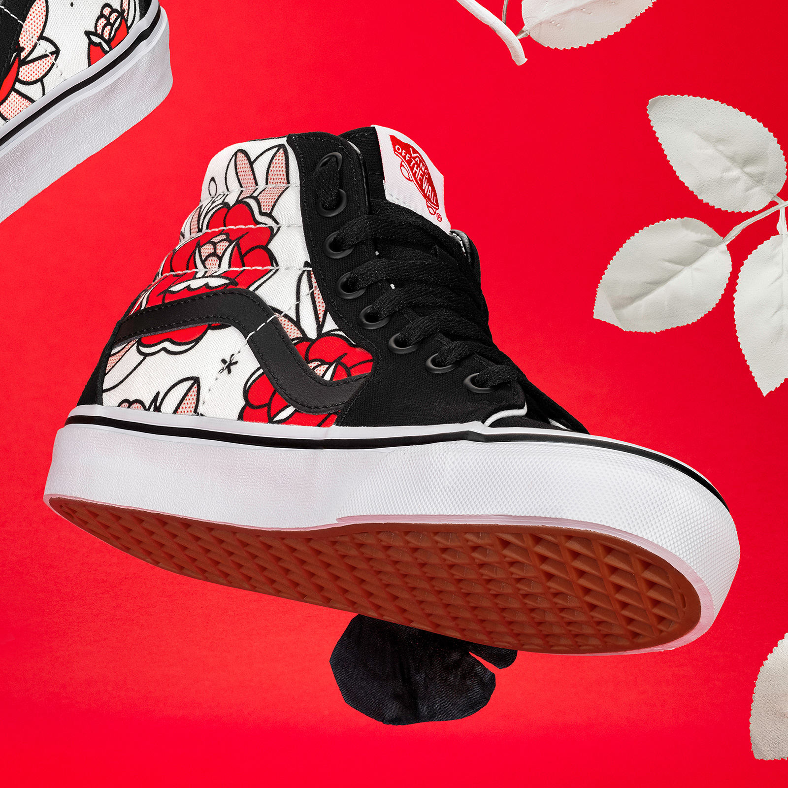 Detail of custom Vans shoe with black, red, and white rose pattern designed by Red Halftone