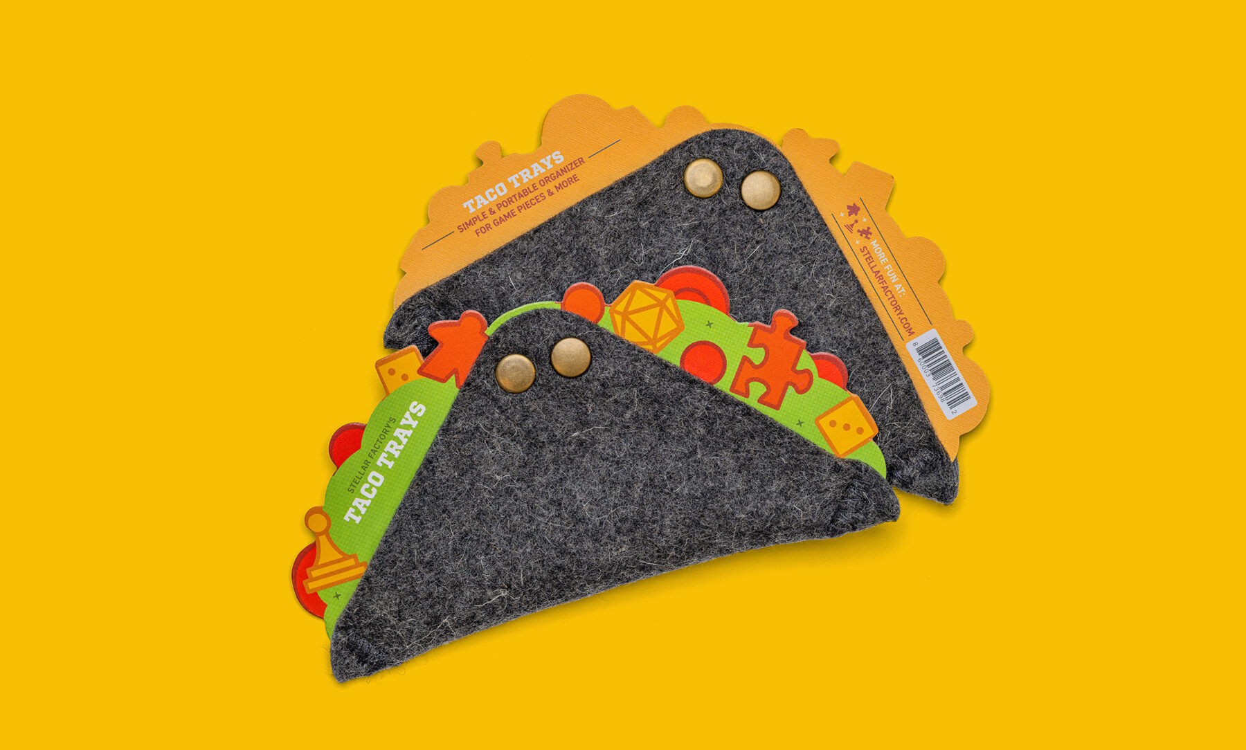 2 taco trays showing off the colorful front and back side of the packaging.