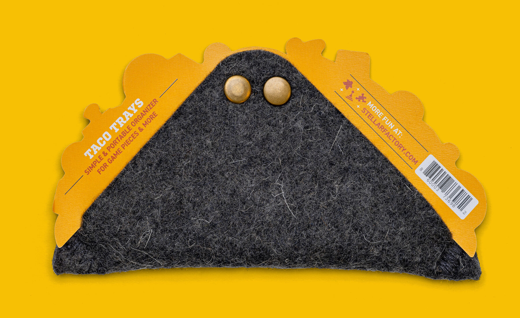 The back side of the taco tray product and packaging featuring a yellow background and text about the product.